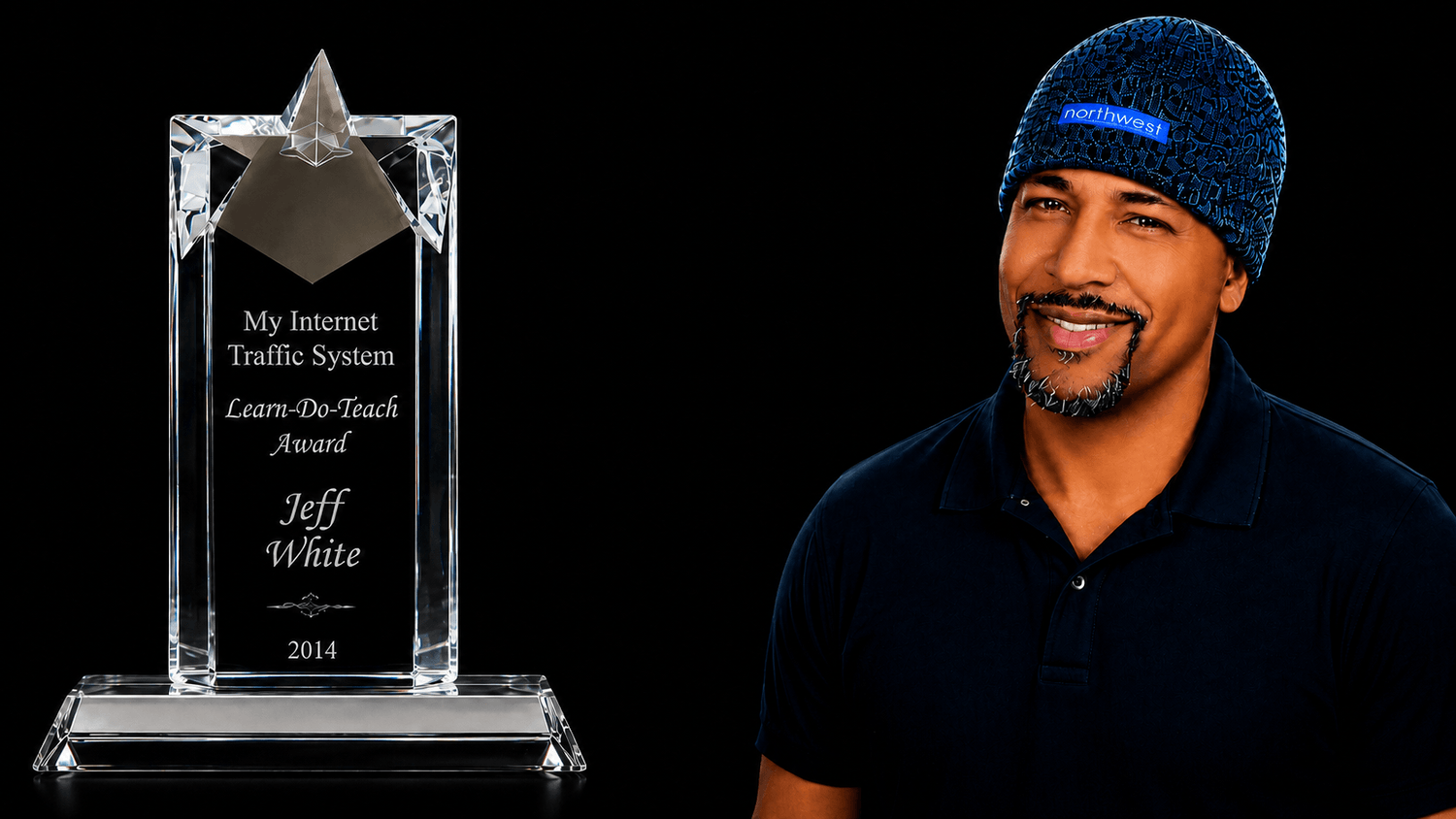 Jeff R. White beside a Learn-Do-Teach Award for his Internet Traffic System